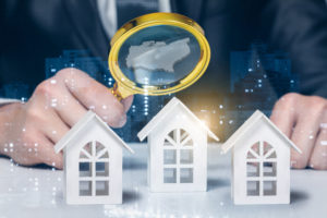 searching for property through a magnifying glass